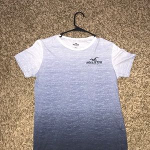 Men’s blue Hollister tee, two different size logos